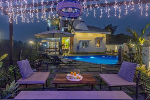 Nagaon Villa | ELIVAAS Moonlit retreat 3 BHK with Garden & Pool