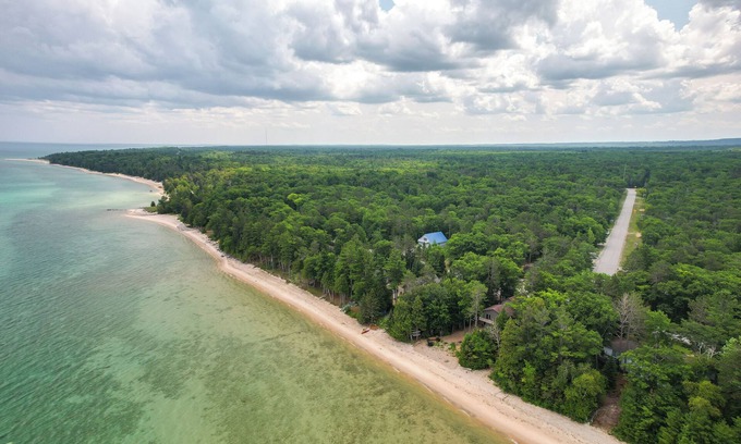 Rogers City Cabin | Enchanted Lake Huron Cottage w/Beach Access!