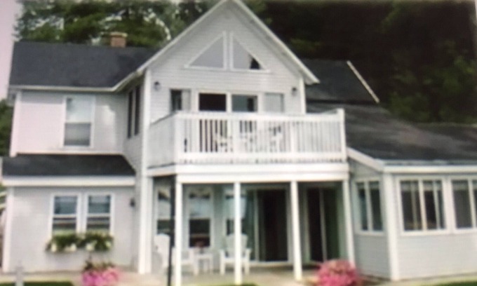 Traverse City Cottage | Enjoy Sunrises & Sunsets from Our 150 Feet of Sandy Beach!