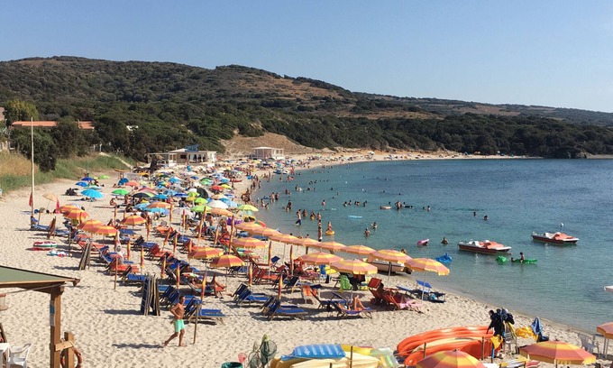 Paduledda Apartment | Equipped one-bedroom apartment with charming sea view, shared pool and washing machine