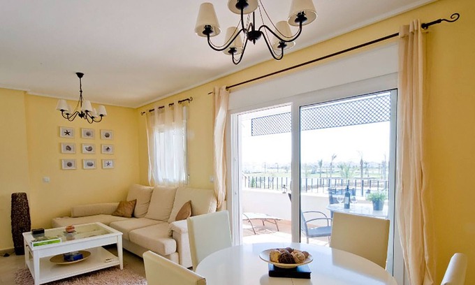 Roldan Apartment | Great views over pools, golf course, lake & mountains from sunny balcony