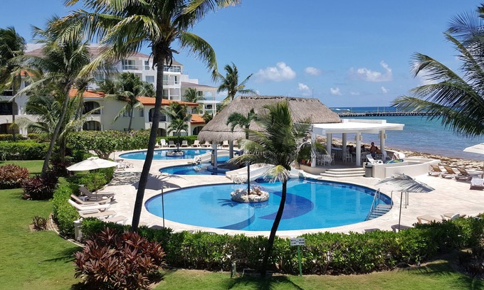 Playacar Fase I Condo | Exceptional Ocean-Front 2 bedroom Condo in Xaman Ha 7102 - Playa Del Carmen