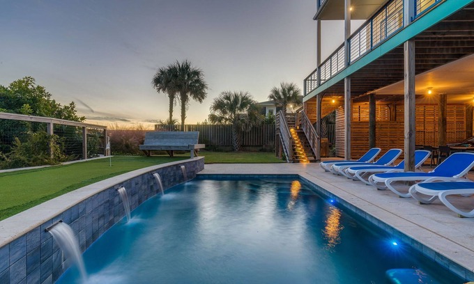 Folly Beach House | Exquisite Oceanfront Oasis: Immerse in Luxury with Pool & Putting Green at this