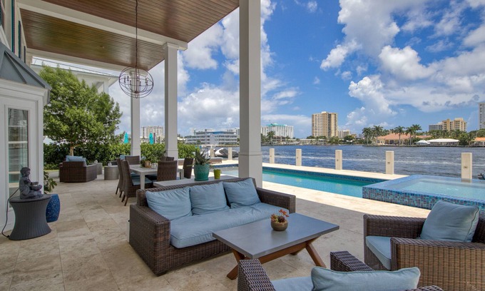 Pompano Isles House | Exquisite waterfront home with a pool, large yard, & grill - close to the beach