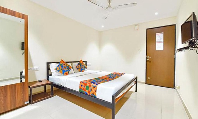 Surat Hotel | FabHotel Happy Rooms