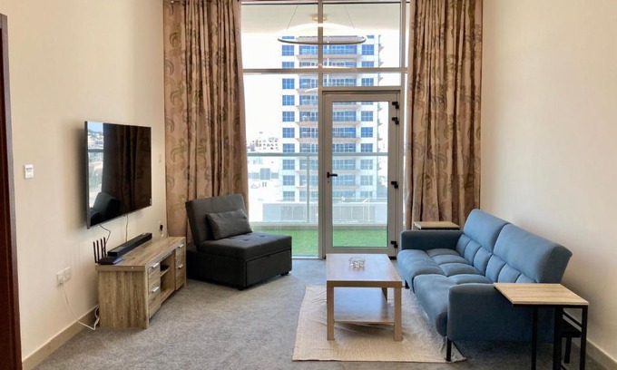 Discovery Gardens Apartment | Family-friendly Apartment Beautiful sunset views from balcony Easy access to metro