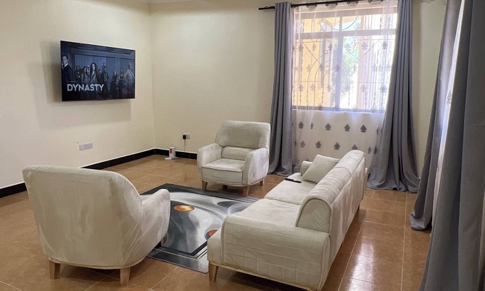 Dar es Salaam Apartment | Family friendly Charming 2-bedroom apartment with AC, WiFi in Dar es Salaam