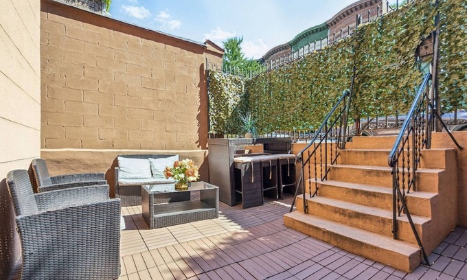Upper Manhattan Apartment | Family-Friendly Duplex Near Subway | Patio + Games