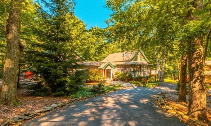 Pocono Lake House | Family friendly home away from home. Indoor hot tub. Fire pit. Game room.