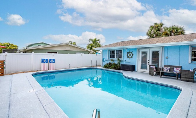 Merritt Island House | Family Vacation Home with pool, canal access for fishing or kayak with dolphins