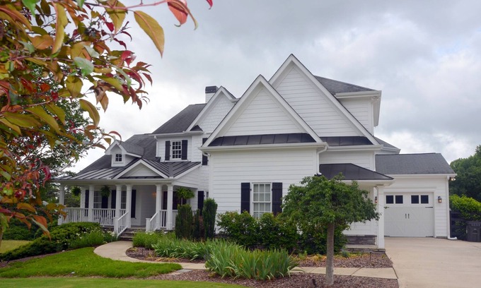 Suwanee Other | Farm Style home with a pool and game room to stretch out and have family fun.