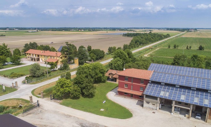 Palazzolo dello Stella Apartment | Fattoria 1, spacious apartment in the farm courtyard