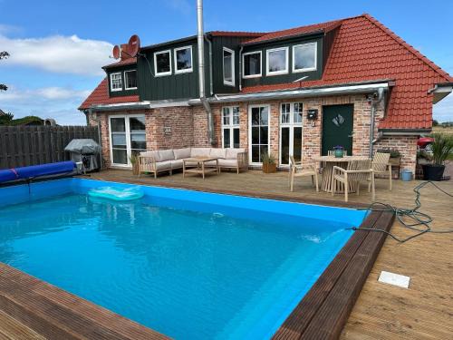 Ostermarsch House | Ferienhaus"Huus an`t Diek" Luxus in Deichnähe mit Pool, Nähe Norddeich