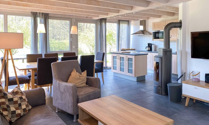 Muritz House | Ferienhaus Wiesengeflüster W10 mit Sauna, Kamin und Garten