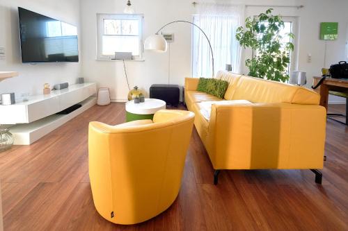 Muritz Villa | FLEESENTRAUM Seevilla Kormoran - Direkt am Fleesensee - Familien und Aktivurlauber - Whirlpool Sauna Garten Nintendo - SUP Kanu Kajak inklusive