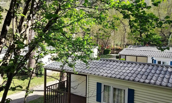 Anduze House | Flower CAMPING FAUVETS * - Mobile home MEDITERRANEE Comfort 26m2 (2 bedrooms)+ covered terrace 6,20m2 - side Cevennes+ air conditioning + tv 5 persons