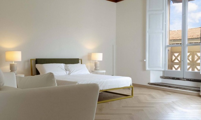 Historic Center Ski Chalet | Frame Bologna [Queen suite with private ensuite bathroom]