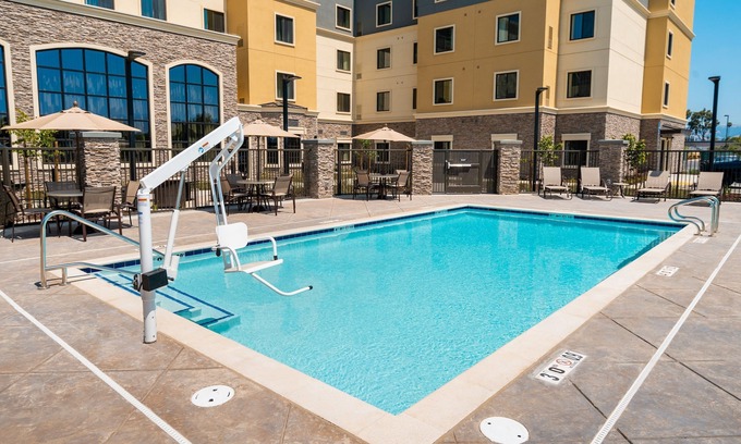 Newark Condo | Free Breakfast. Pool. Shared BBQ. 30 Min to Oakland Zoo!