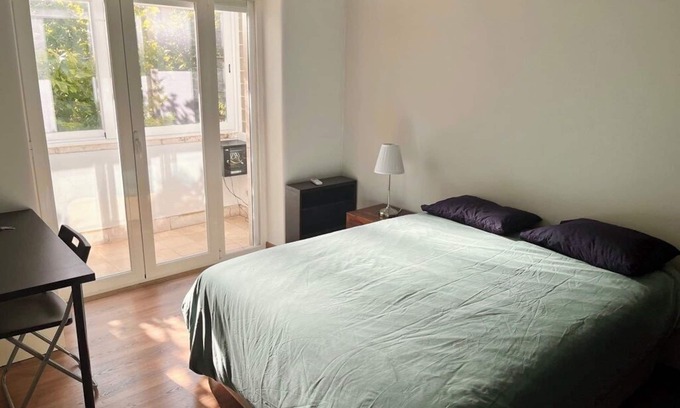Benfica Apartment | Fresh, Sunny Lisbon Apartment with WiFi, In-Unit Laundry, AC