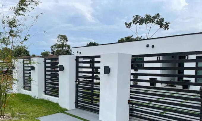 Golden Glades Villa | Glory to God, A Modern Villa! Near Beach.