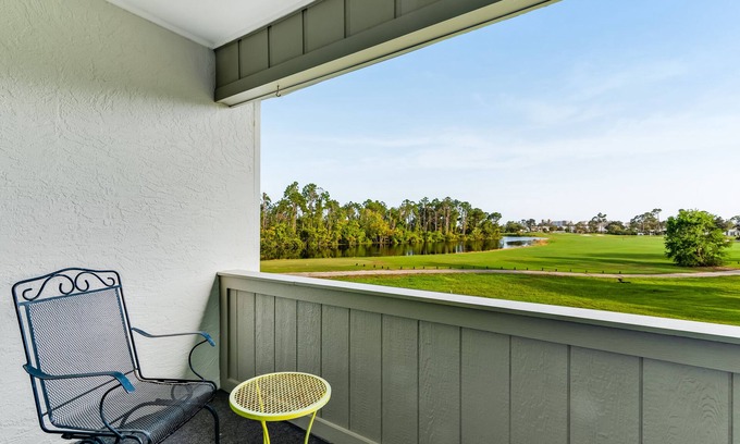 Upper Grand Lagoon Condo | Golf course-adjacent home with shuffleboard table & furnished patio