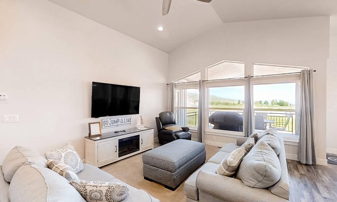 Sweetwater House | Golf course home with lake views, WiFi, deck & patio, shared pools & hot tub