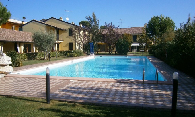 Moniga del Garda Apartment | Gorgeous 3-room apartment in Moniga del Garda with swimming pool and terrace