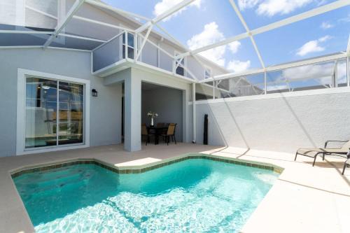 Florida Central Atlantic Coast House | Gorgeous 4Bd Close to Disney w/Pool @ Champions Gate Resort 1196