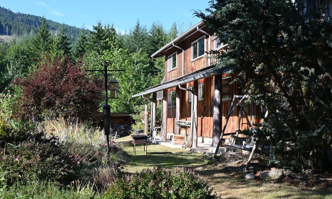 Port Angeles House | Gorgeous log cabin homestead amidst gardens just west of Port Angeles
