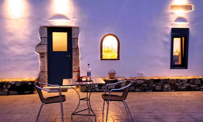 Lagoudi Zia Apartment | Grandpa's place - a 150year-old stone built house- near Zia's sunset balcony