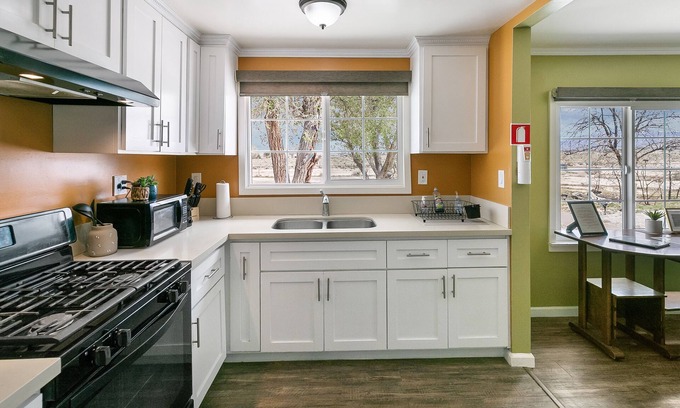 Lucerne Valley House | Green mailbox Green house