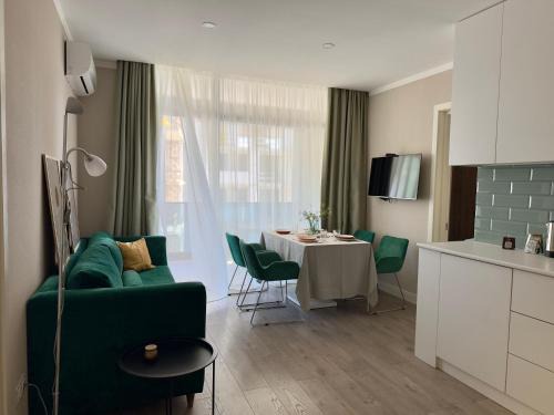 Gonio Apartment | Greenside Emerald Apartment by brege