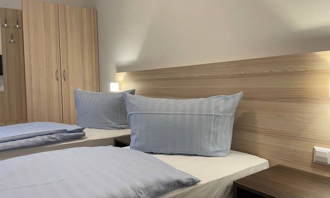 Pasewalk Bed & Breakfast | Guest house apartment 107 - Lokschuppen Pasewalk- Guest houses with double rooms, single rooms and