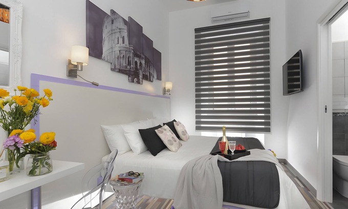 Prati House | Guest House 'Rome's Heart - Violet Room' with Wi-Fi and Air Conditioning