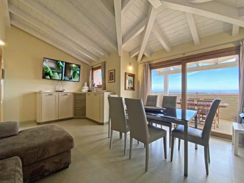 Budoni Apartment | H41 Attico moderno vista mare in centro storico Budoni