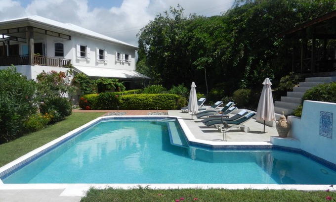 Saint David's Villa | Half Moon Villa :- A beautiful villa with a large pool & garden, ocean views.