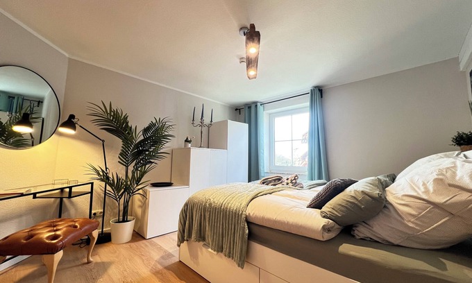 Petersdorf Apartment | HAPPY DAYS Fehmarn -Your vacation & your happiness- 91 sqm balcony with field view and fireplace