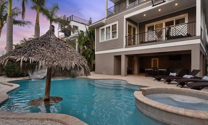 Holmes Beach House | Harbor Haven! Pool with with water slide! Sleeps 14!