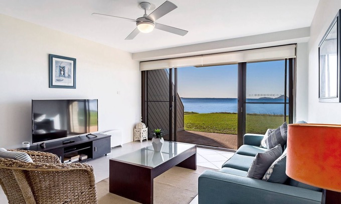 Soldiers Point Apartment | Harbourside, Unit 2/7 Soldiers Point Road - Absolute waterfront unit at Sunrise Beach