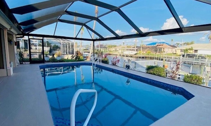 Pelican House | Heated Pool/Waterfront/Canal/Dock/Gulf Access, Private Sunny Home