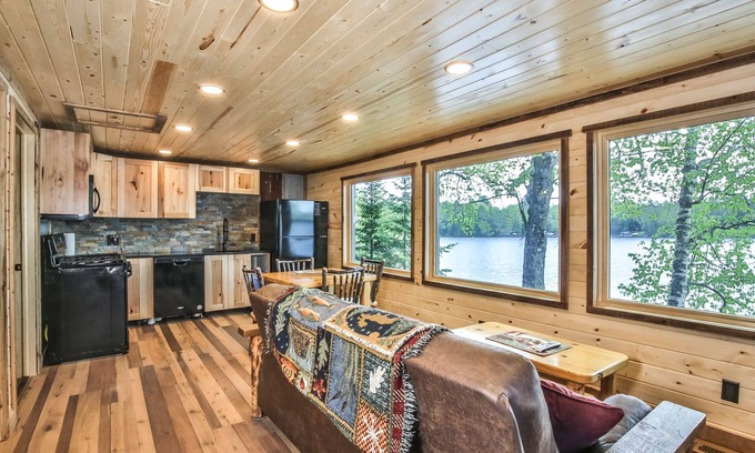 St Germain House | Heavenly lakeside cottage with fireplace, personal dock, and sandy beach!