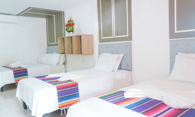 Sucre Hotel | Hermosa Habitación Estándar Familiar A Pie De Playa