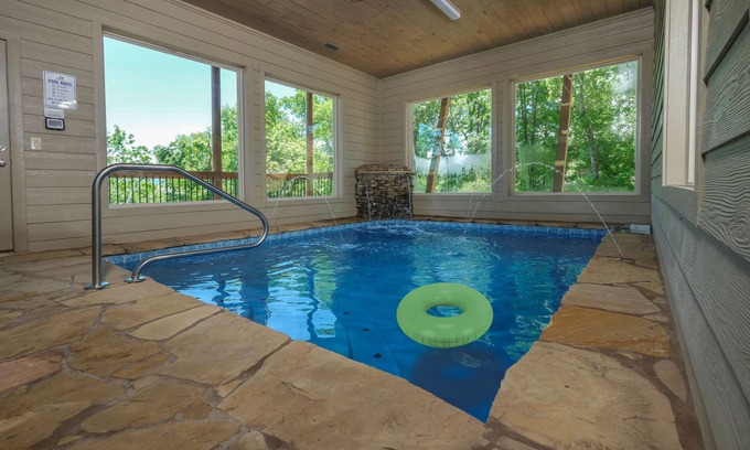 Sevierville Cabin | Hibernation Hideaway - Private indoor pool, theater room, hot tub, games, and more!