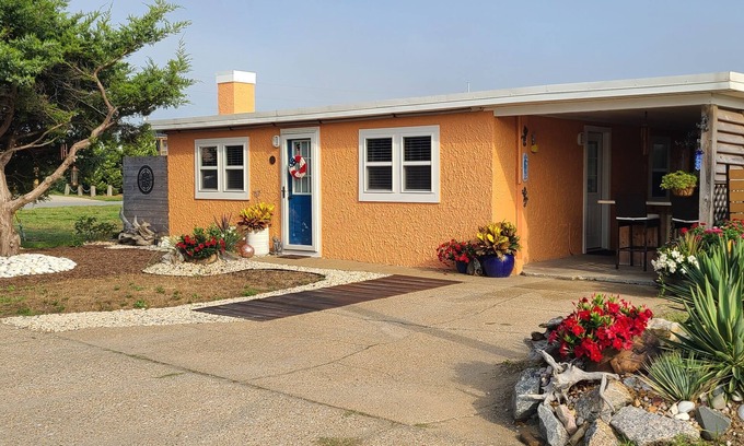 Colington Cottage | Historic Cottage Steps from the Beach and Dog Friendly!