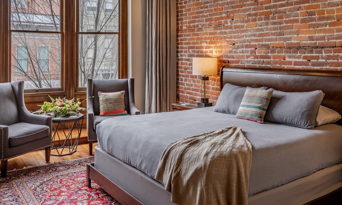 Adelma Beach Apartment | Historic Town View Room with bay window overlooking Water Street
