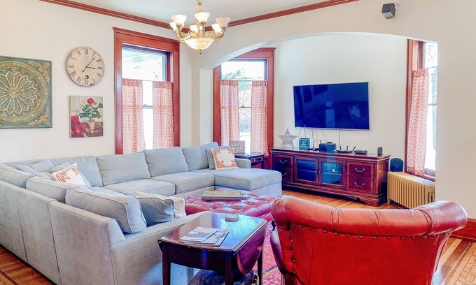 Manistee House | Historical dog-friendly home with fenced yard, grill, Ping-Pong, fireplace, & AC