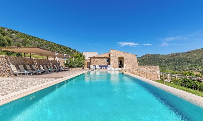 Sant Llorenc des Cardassar Villa | Holiday Home Ses Voltes with Mountain View, Wi-Fi, A/C, Pool, Garden & Terrace