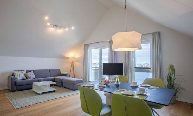 Olpenitz Apartment | Holiday Apartment "Reeders Topp by Seeblick Ferien" with Harbour View