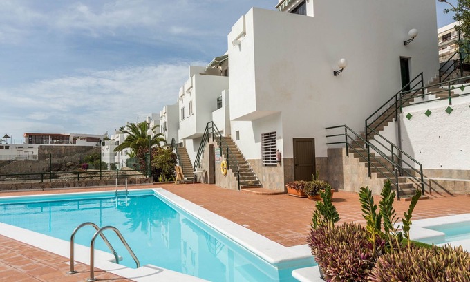 Puerto Rico Apartment | Holiday Apartment 'Casa Luca' with Wi-Fi, Terrace & Shared Pool