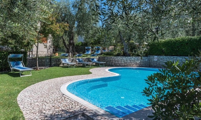 Malcesine Apartment | Holiday Apartment “Casa Stefi N1” close to lake Garda with Balcony, Garden & Pool